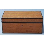 A vintage retro Alfred Dunhill walnut cigarette box having ebonised borders and escutcheon to the