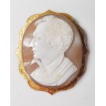 A late 19th / early 20th Century cameo brooch having a carved conch shell panel decorated with