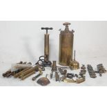 A impressive large collection of 20th century antique brass items to include several brass air pumps