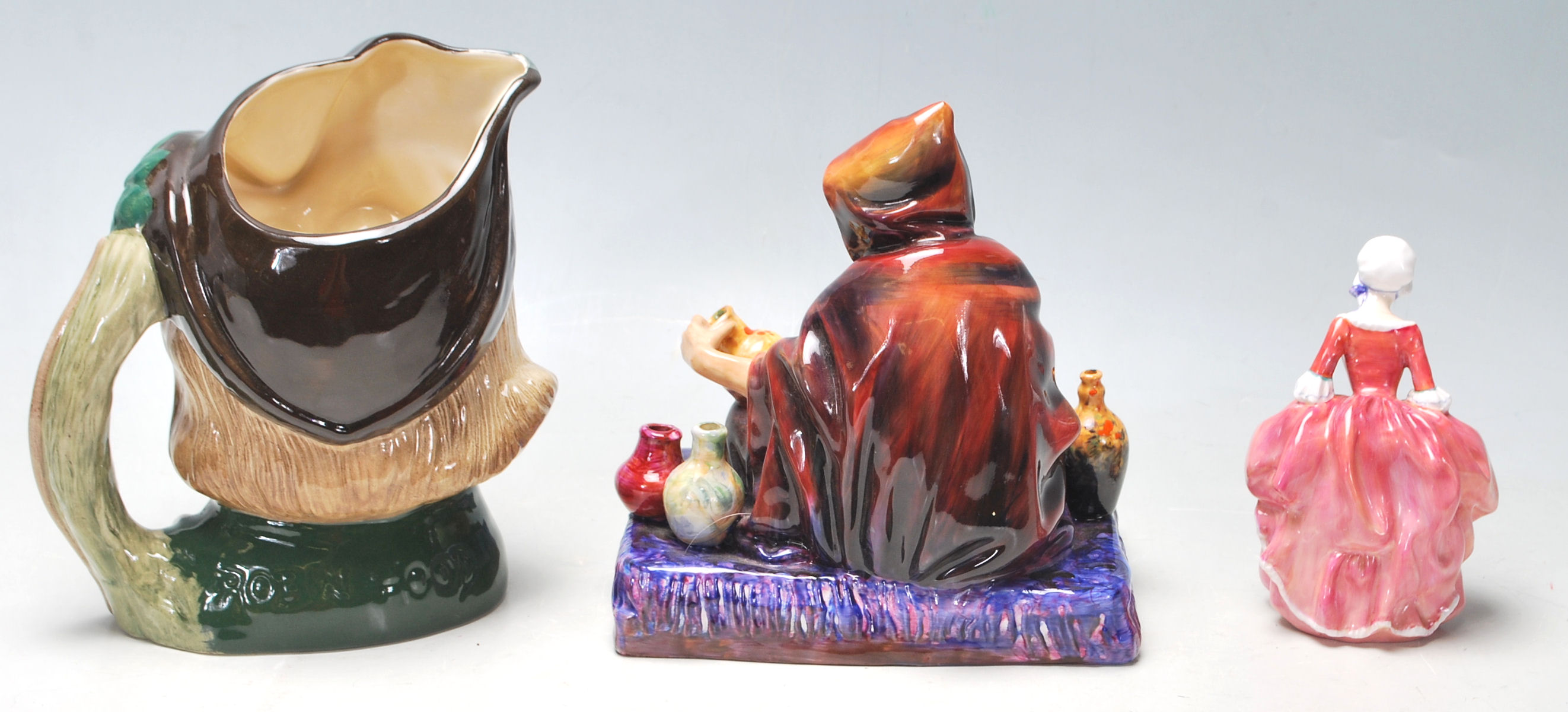 A collection of 20th century Royal Doulton figurines to include Robin Hood D6527, The Potter HN1493, - Image 3 of 8