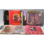 A collection of vintage Jazz long play LP record albums to include: Theolonious Monk, Duke