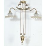 A good 20th century Dutch brass light in a manner of a 18th  century chandelier having two