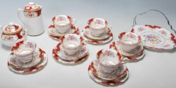 A Royal Albert Canterbury bone china tea service comprising of a trio of six cups saucers and cake