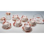 A Royal Albert Canterbury bone china tea service comprising of a trio of six cups saucers and cake