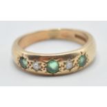 GREEN AND WHITE STONE 9CT GOLD GYPSY RING