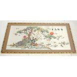 A retro vintage late 20th Century Chinese needle work embroidery fabric picture of peacocks,