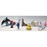 A collection West German Goebel and USSR Russian porcelain animals to include boy, elephant, seal,