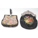 A good 20th century antique petit point bag with faux carved jade clasp and floral decoration to the