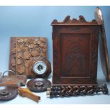 A good collection of 20th century antique wooded carved items to include a small hand carved wall