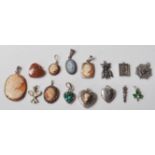 A group of fifteen vintage silver and pendants to include a heart shaped pendant set with a cameo