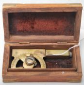 A 20th Century brass surveyor's instrument by Stanleys of London. The instrument has a brass