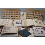 A large collection of stamps dating from the 19th century to include several Penny Reds, Penny Blue,