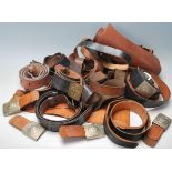 A good large collection of late 20th century German military leather belts / buckle belts to include