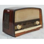 A large mid century walnut lacquered valve radio of lozenge by Orion Imp Type AR 612. The large case