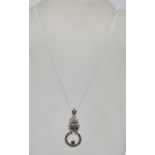 A stamped 925 Cartier style silver pendant necklace having a pendant in the form of a leopard set