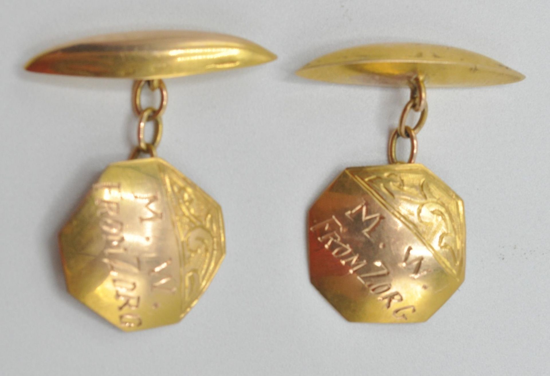 A pair of vintage 14ct gold cufflinks having octagonal panel haved engraved M. W from Zorg with