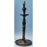 An early 20th century Japanese candlestick converted in a table lamp / desk lamp having Japanese