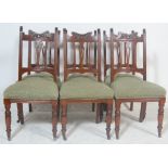 A set of 6 late Victorian mahogany Art Nouveau dining chairs. Raised on turned legs with overstuffed