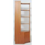 A retro vintage early 20th Century teak wood corner unit / bookcase / display shelves in the