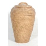 A retro 1950's mid century wicker / rattan woven middle eastern ' snake charmer ' laundry basket.