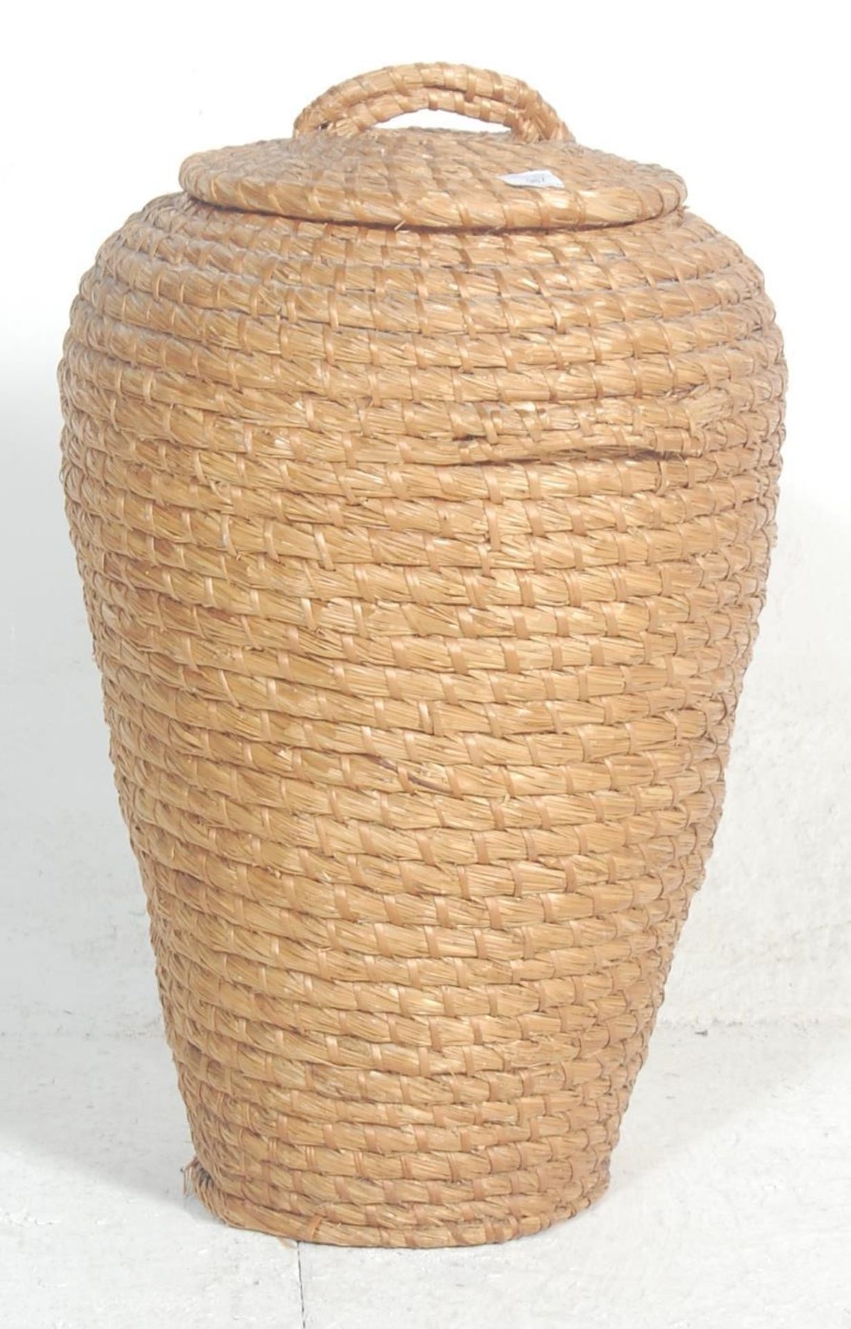 A retro 1950's mid century wicker / rattan woven middle eastern ' snake charmer ' laundry basket.