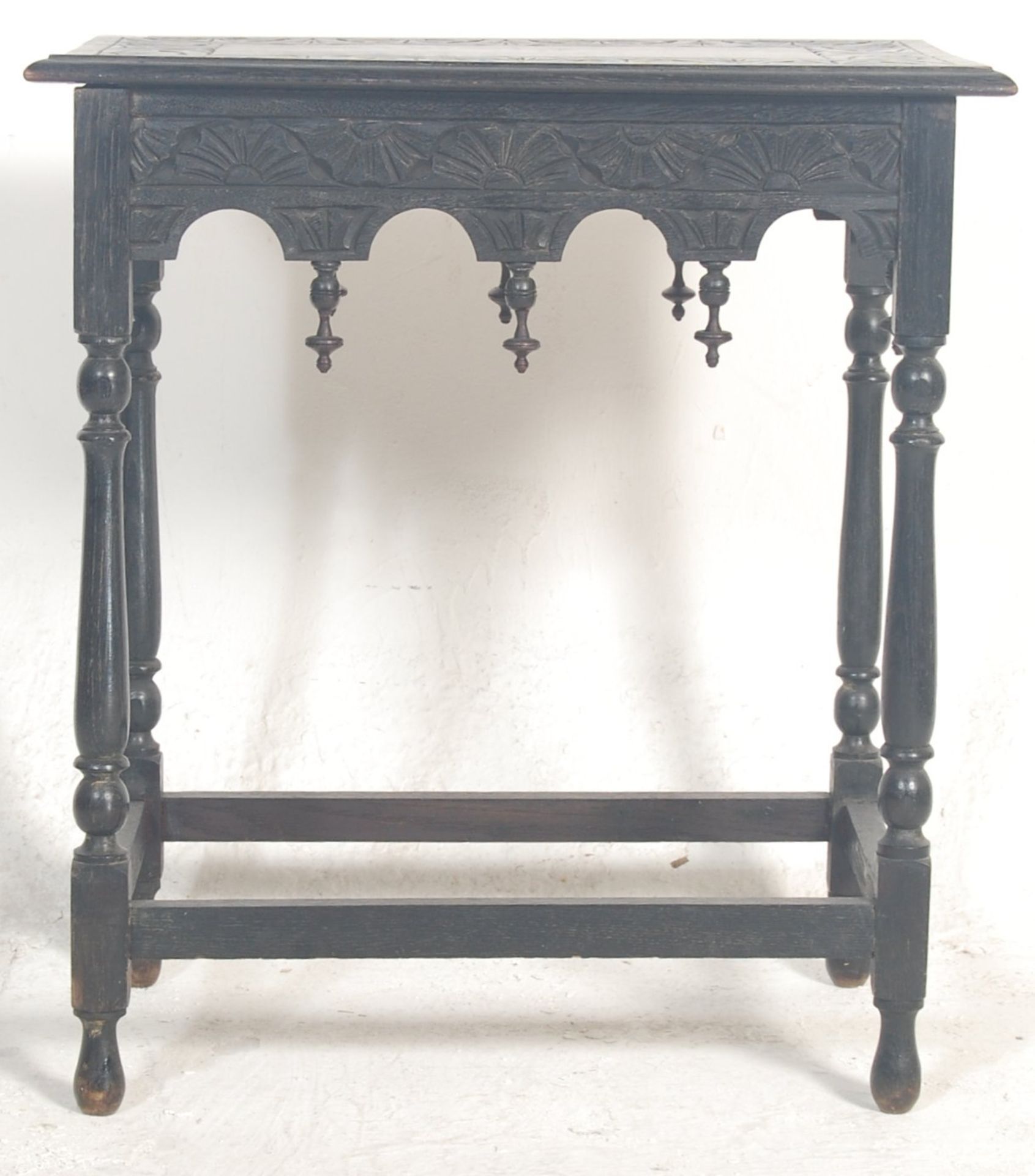 A 19th Century Victorian oak occasional / side table having a carved tabletop on a flared - Bild 2 aus 4