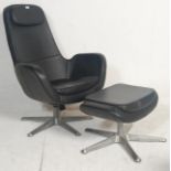 A retro style black leather IKEA arkiva swivel chair and footstool. The chair having a cushioned