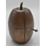 An 18th Century Georgian style fruitwood tea caddy in the form of a melon with lock and key to