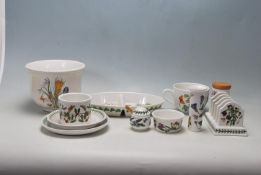 A 20th century Portmeirion botanical garden items to include vase, pot, toast rack, large cup,