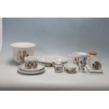 A 20th century Portmeirion botanical garden items to include vase, pot, toast rack, large cup,