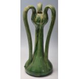 A vintage 20th Century French studio pottery vase having three curved handles to the top with a