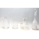 A mixed collection of glass to include retro and antique examples cut glass decanters, antique