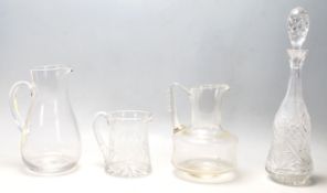 A mixed collection of glass to include retro and antique examples cut glass decanters, antique
