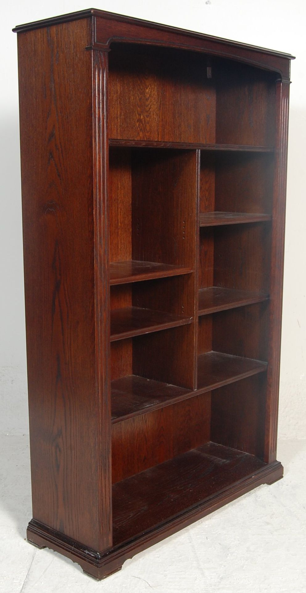 A good Jaycee / Old Charm style Jacobean revival oak open window large library bookcase. Raised on