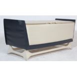 A good vintage mid 20th century circa 1950's blanket box/ottoman having hinged lid revealing a white