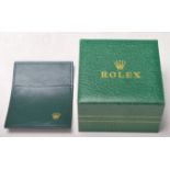 A vintage Rolex watch Geneve Suisse box having a green leather finish with a wave design panel to