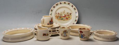 A group of Royal Doulton Vintage “ Bunnykins “ ceramic to include plates, cups, saucers, dish, etc