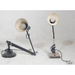 Two vintage retro desk lamps to include a black painted example raised on a round base with