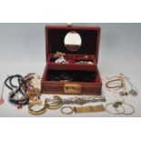 A collection of vintage 20th century costume jewellery to include necklaces, broaches and others.