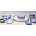 A COLLECTION OF WILLOW BLUE AND WHITE POTTERY CERAMIC PLATES