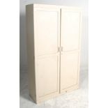 A mid century retro 1950's school cupboard / factory industrial. Painted white in shabby chic style,