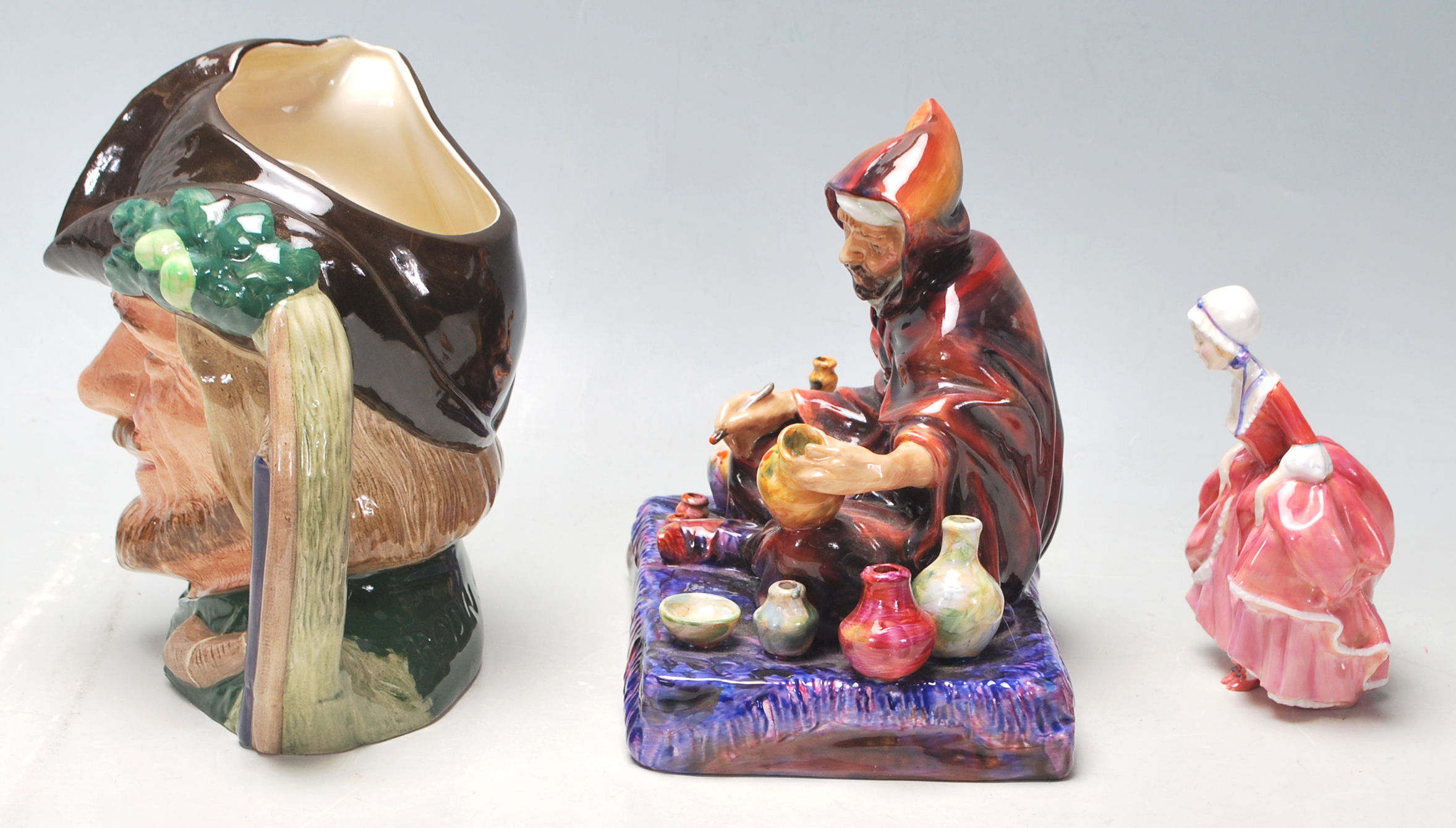 A collection of 20th century Royal Doulton figurines to include Robin Hood D6527, The Potter HN1493, - Image 4 of 8