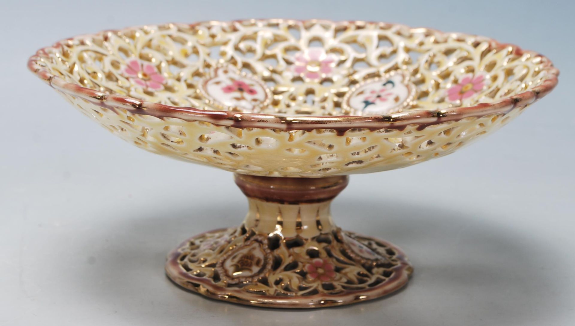 A Victorian 19th Century Hungarian - Zsolnay Pecs pierced porcelain pedestal stand of circular