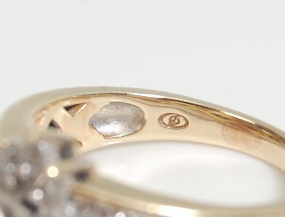 A 14 ct gold and diamond ladies ring having a central marquise cut diamond with further round and - Image 5 of 7