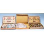 A collection of three early 20th Century wooden toy jigsaws to include a 200 piece White Star Liner