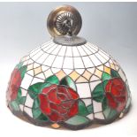 A 20th century Tiffany style leaded and stained glass ceiling chandelier - light. The bowl shade