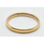 A hallmarked 22ct gold band ring of plain form. Assay marked for London. Weight 1.8g. Size I.5.