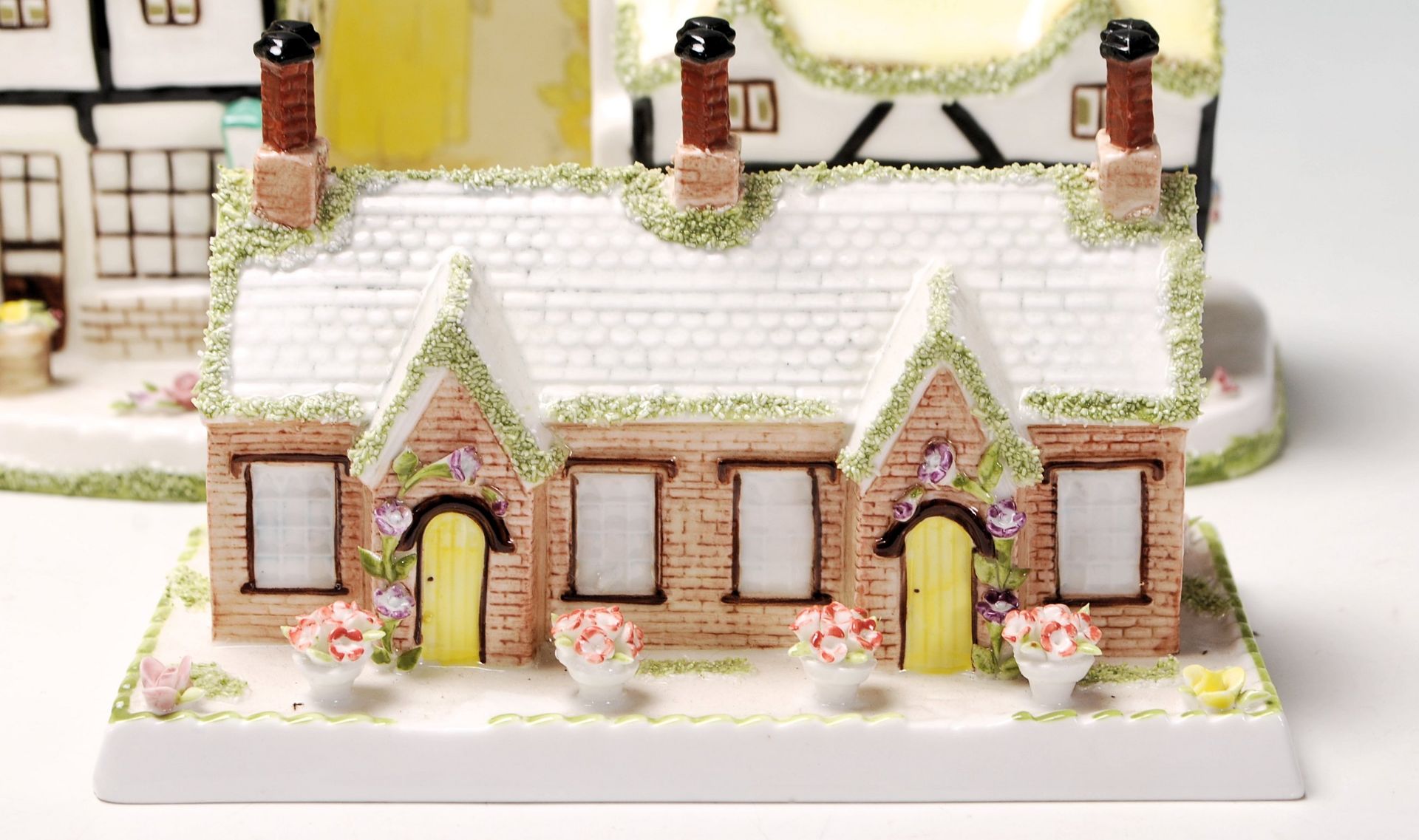 A collection of fine bone china cottages and florals by Coalport to include The Coaching Inn, - Bild 9 aus 20