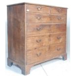 A George III 19th century oak 2 over 4 North Country chest of drawers. Raised on bracket feet with 2