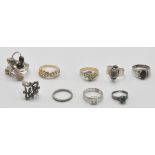 A collection of nine silver 925 rings most of them with precious stones. Total gross weight: 44g